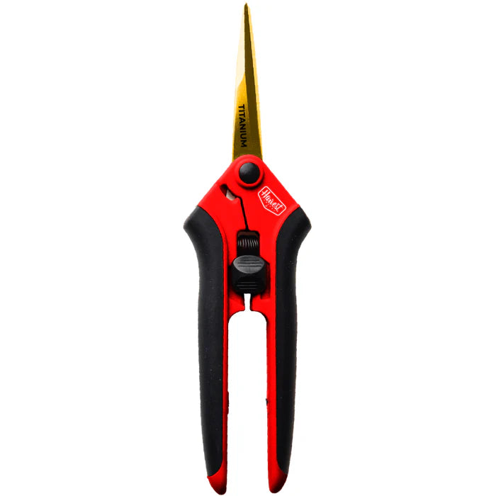 Red and black pruning shears with gold blades on a white background