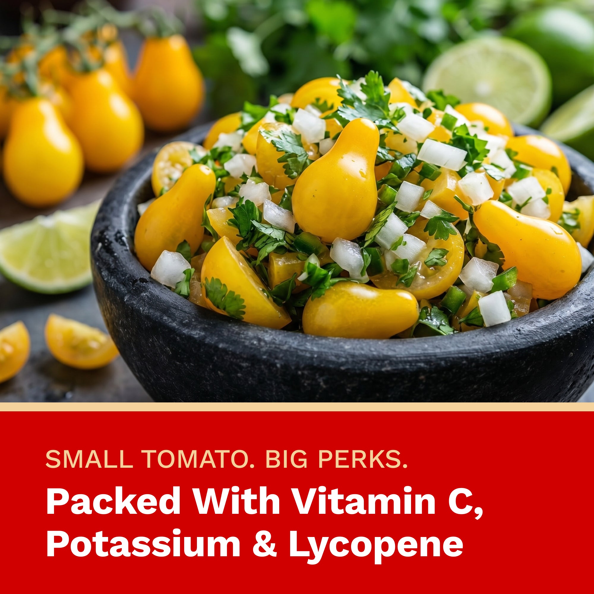 Mortar and pestle with yellow cherry tomatoes, herbs, and lime on a wooden surface.