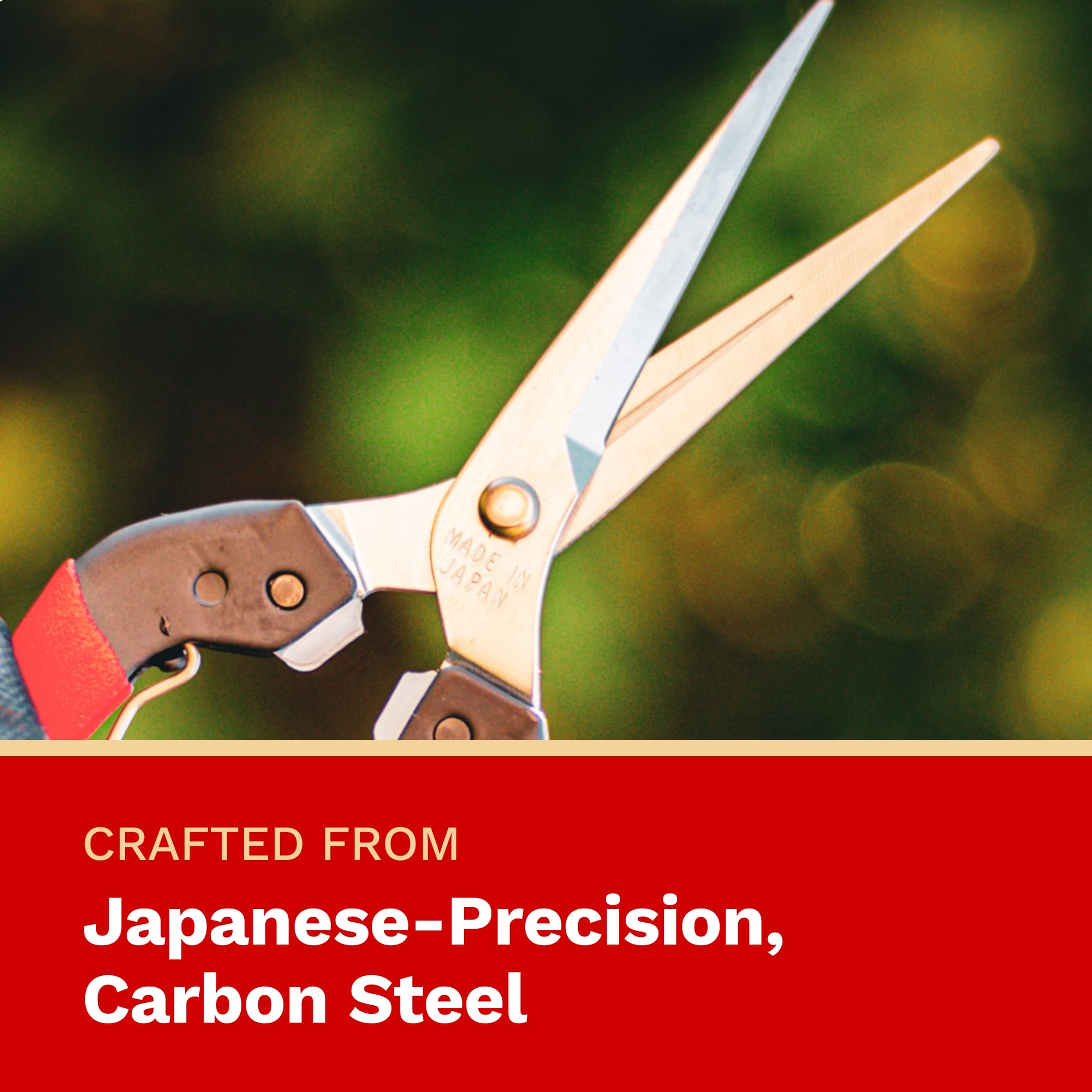Gardening shears with text about Japanese precision carbon steel on a blurred green background