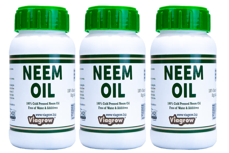 Three bottles of Viagrow brand 8oz cold pressed neem oil seed extract, with green caps and labels that display the product information.